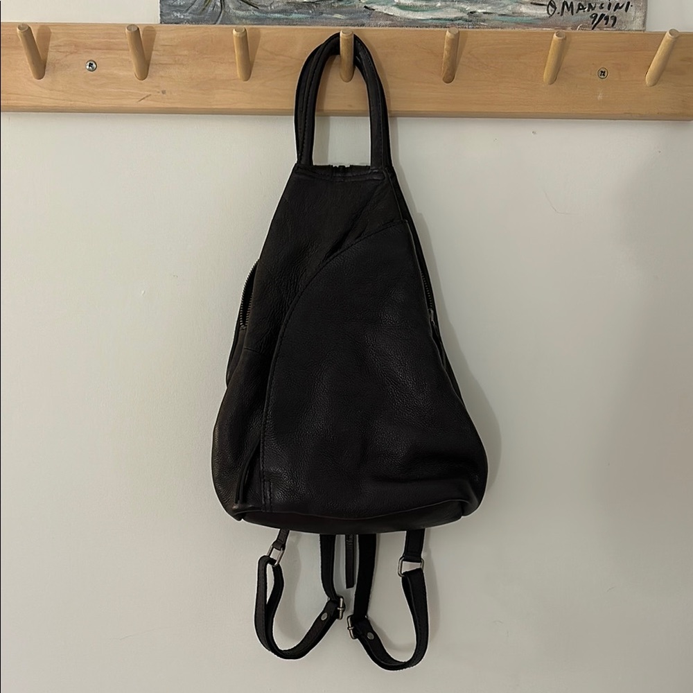 We The Free Soho Convertible Sling Bag. Color: Black.